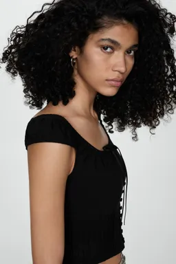 Top crop con botones de Mango en Tops para argentina