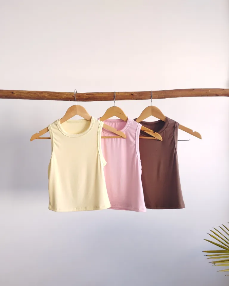 Top básico sin mangas de corte ajustado con escote redondo y diseño minimalista de Lemmon en Tops para argentina