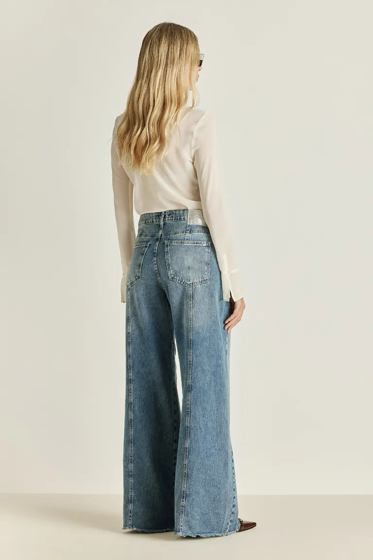 Pantalón de denim de pierna ancha con detalles distintivos y un ajuste relajado para un look fresco y desenfadado de Tucci en Pantalones para argentina