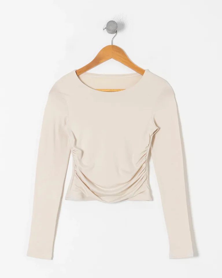 Remera blanca con frunces laterales y espalda simple para un look sofisticado de Sky en Remeras para argentina