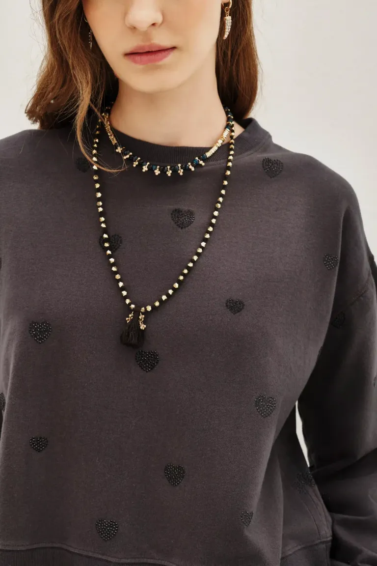 Buzo holgado de cuello redondo con aplique de corazones de tachas brillantes de Rapsodia en Buzos y Sweaters para argentina