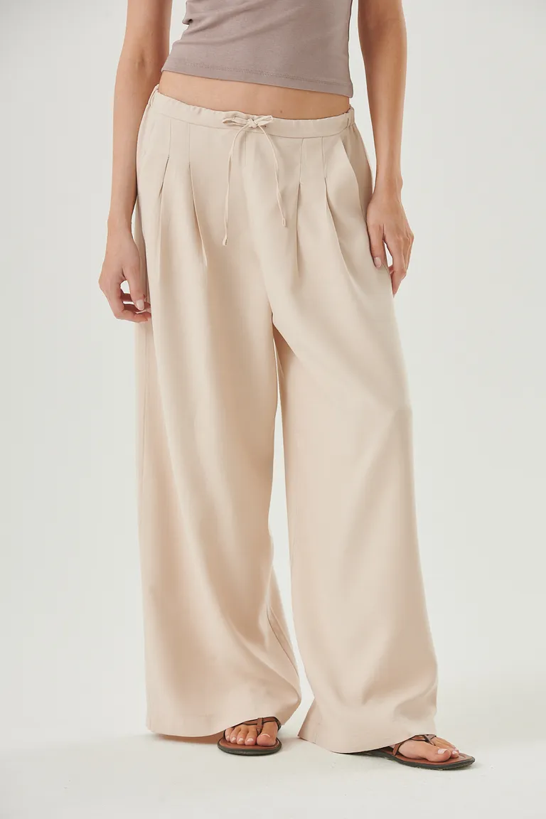 Pantalón de pierna ancha y caída fluida, con cintura elástica y lazo regulable de Sweet en Pantalones para argentina