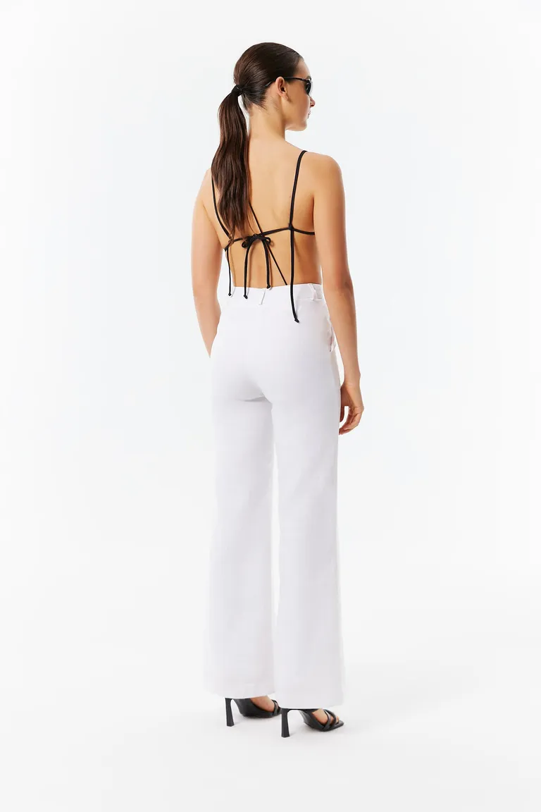 Pantalón de lino recto y suelto en color blanco de Naíma en Pantalones para argentina