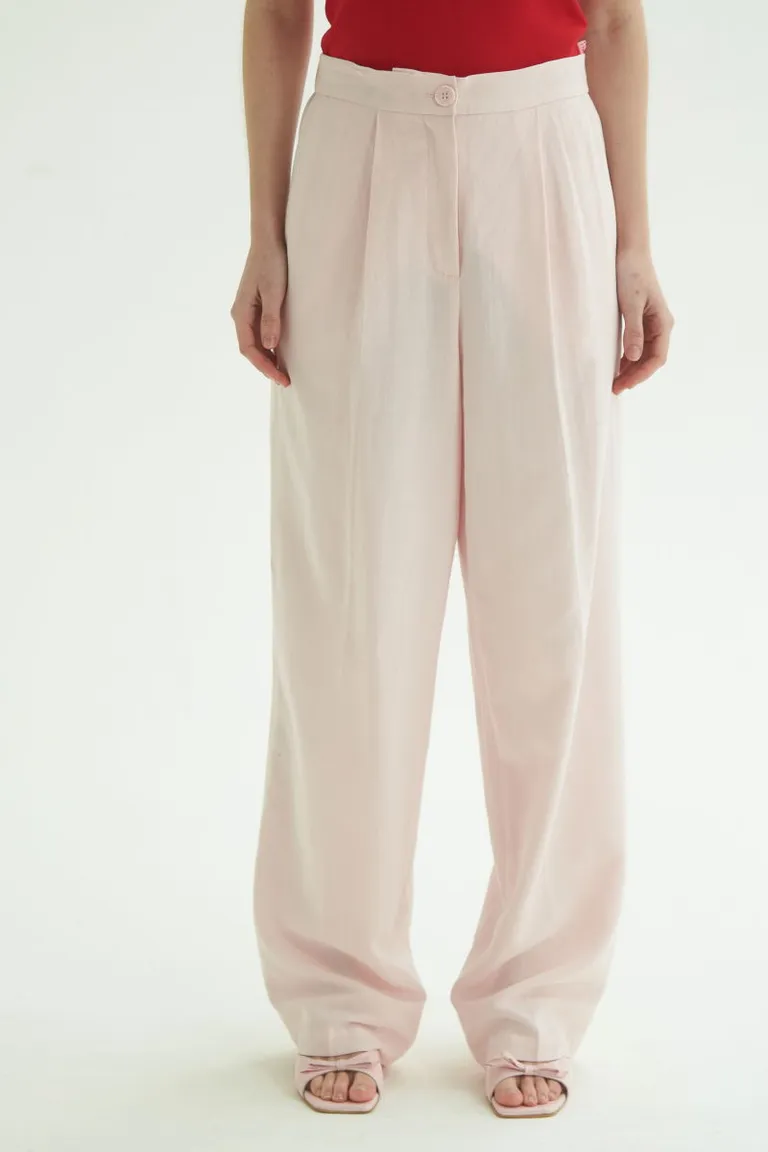 Pantalón de tiro alto y corte recto en tejido natural para un estilo elegante y sofisticado de Las Pepas en Pantalones para argentina