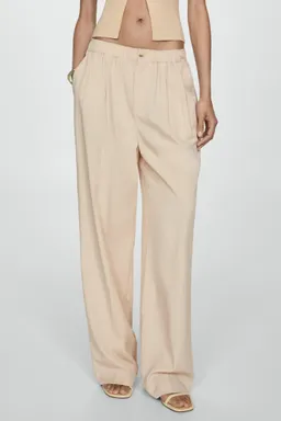 Pantalón lyocell con pliegues de Mango en Pantalones para argentina