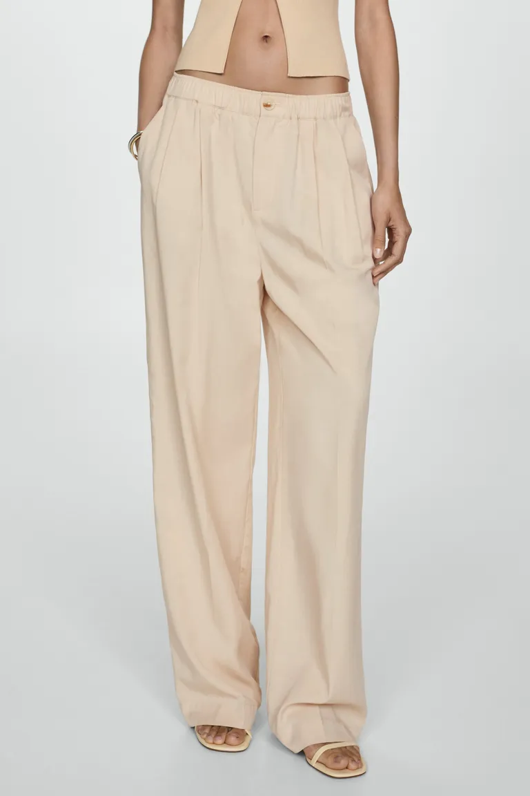 Pantalón lyocell con pliegues de Mango en Pantalones para argentina