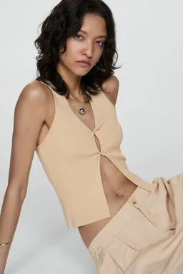 Pantalón lyocell con pliegues de Mango en Pantalones para argentina