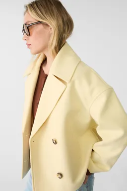 Tapado corto cruzado de Stradivarius en Chaquetas para argentina