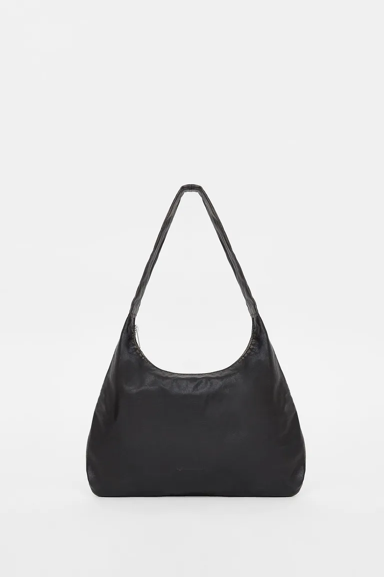 Cartera de cuero estilo vintage con cierre metálico en color negro de Ay Not Dead en Bolsos y Carteras para argentina