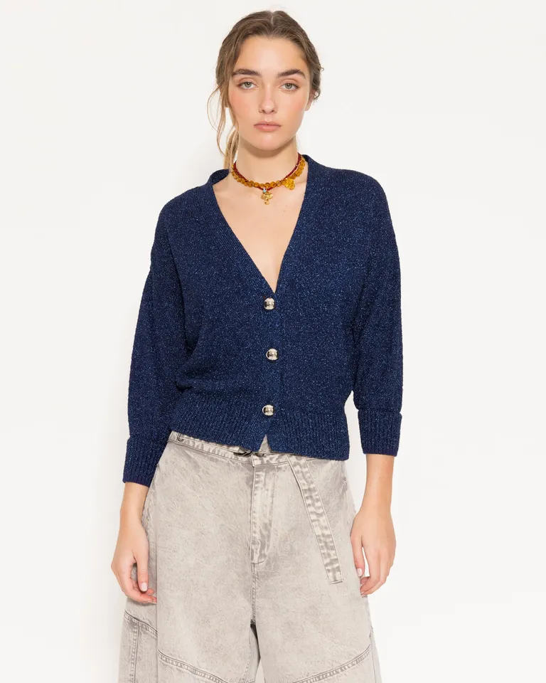 Suéter corto de punto metálico con botones frontales y silueta holgada de Jazmin Chebar en Buzos y Sweaters para argentina