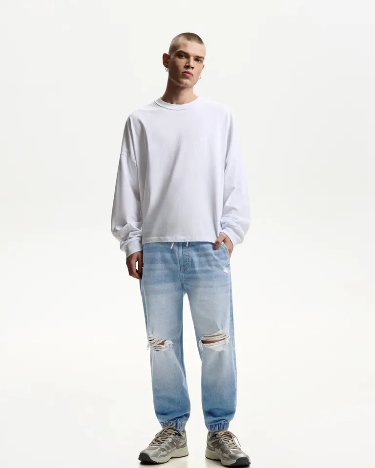 Jeans jogger con roturas de Bershka en Pantalones para argentina