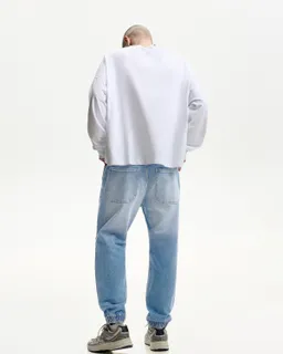 Jeans jogger con roturas de Bershka en Pantalones para argentina