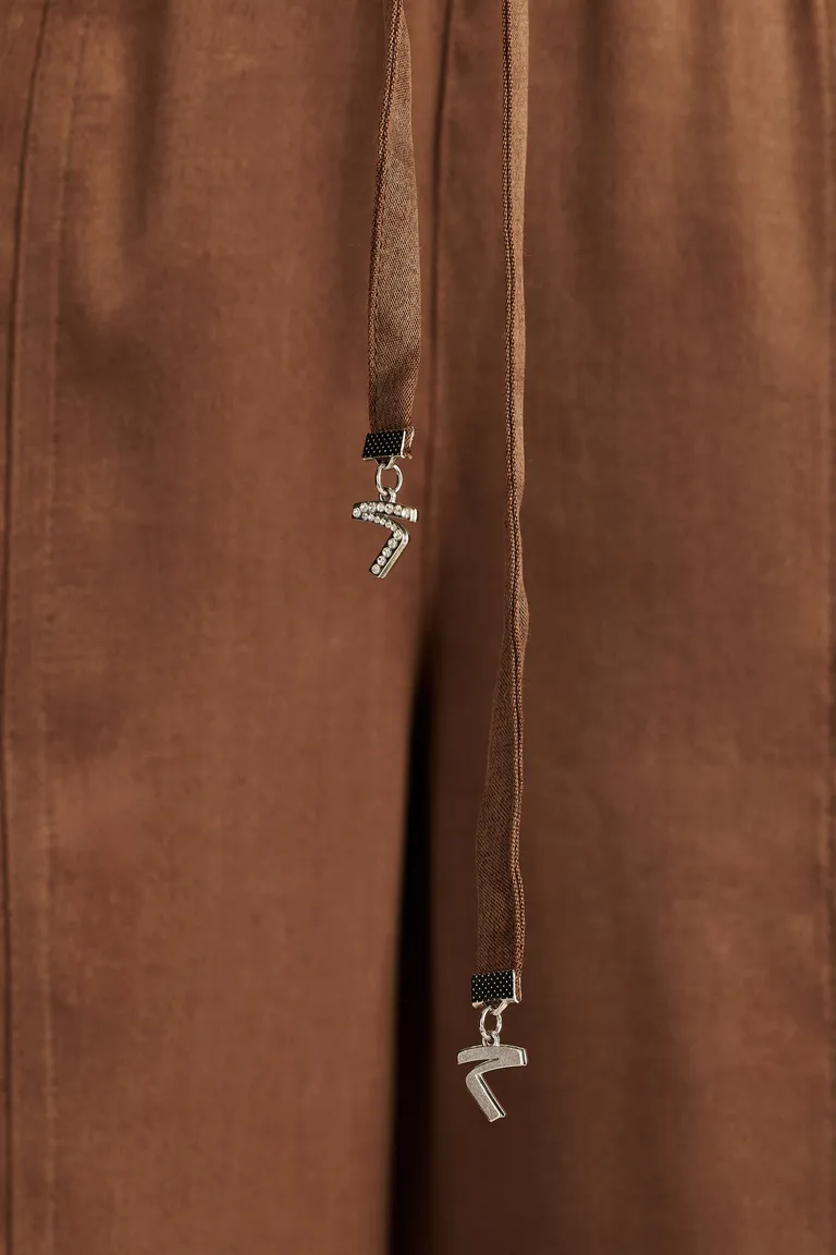 Pantalones con corte relajado y diseño elegante para mujer de Tucci en Pantalones para argentina