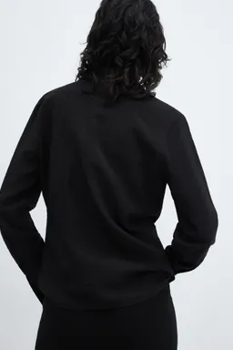 Blusa fluida con lazos de Mango en Blusas para argentina