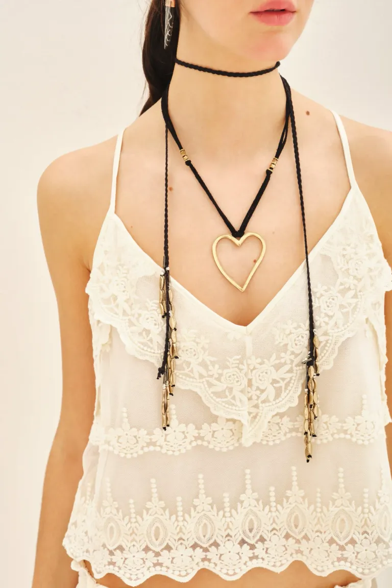 Musculosa de encaje blanco con escote pronunciado y calce suelto de Rapsodia en Tops para argentina