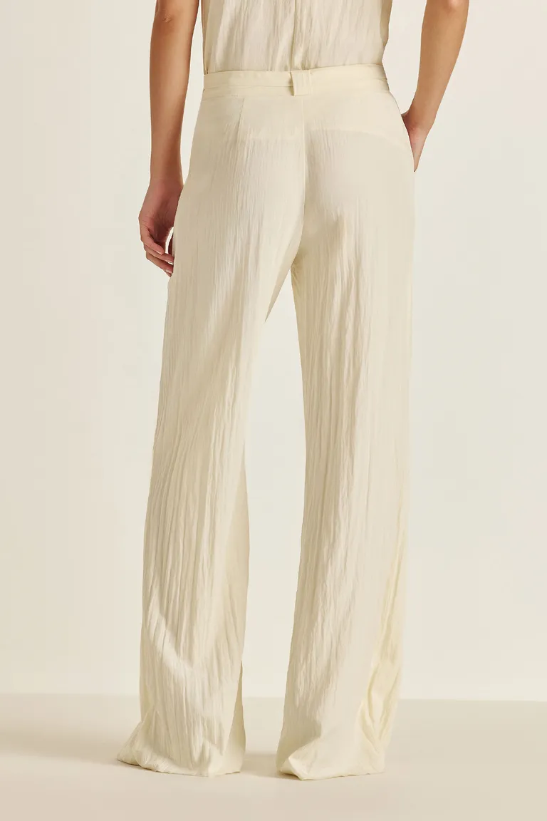 Pantalón beige con lazo ajustable en la cintura para una silueta relajada y elegante de Tucci en Pantalones para argentina
