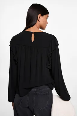 Blusa con volantes de Mango Teen en Blusas para argentina