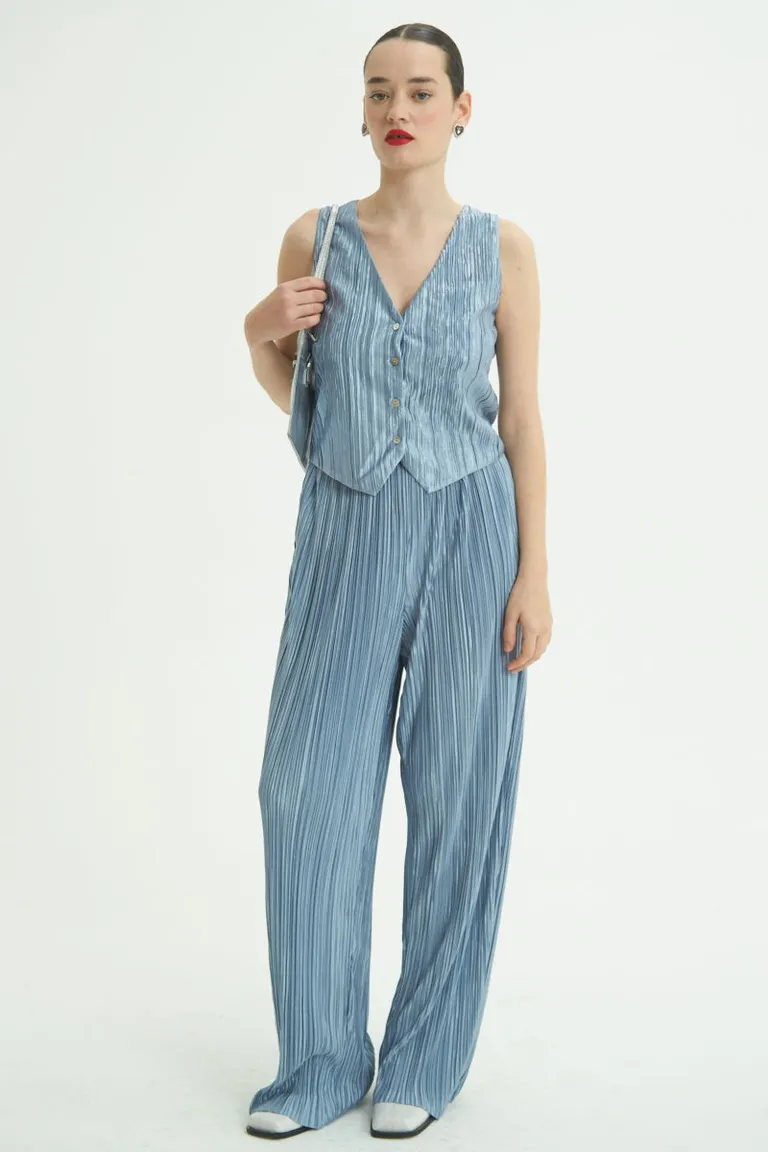 Pantalón plisado de tiro medio, con cintura elástica y detalle brillante de Las Pepas en Pantalones para argentina