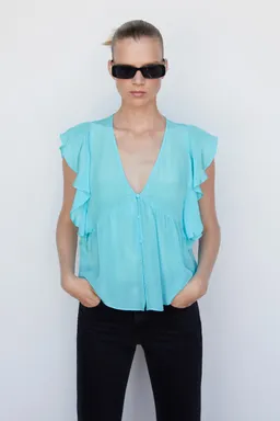 Blusa con volantes de Mango en Blusas para argentina