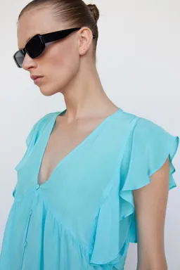 Blusa con volantes de Mango en Blusas para argentina