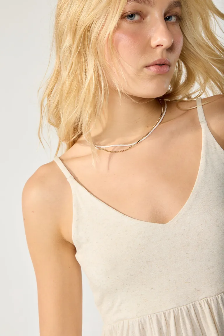 Musculosa en jersey con lino, corte con frunces y escote redondo de Cuesta Blanca en Tops para argentina