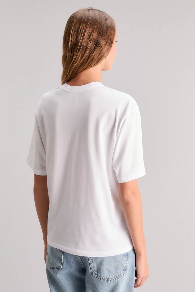 Remera de corte regular con arte en técnica glitter de Kosiuko en Remeras para argentina