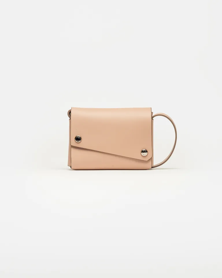 Mini bolso de cuero rosa con diseño minimalista y rígido de Prüne en Bolsos y Carteras para argentina