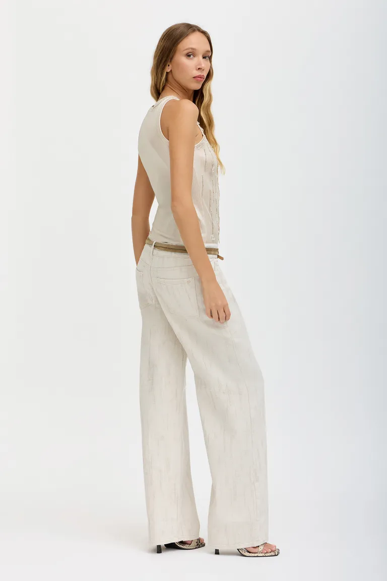 Top de punto blanco con bordado artesanal exclusivo de Tucci en Tops para argentina