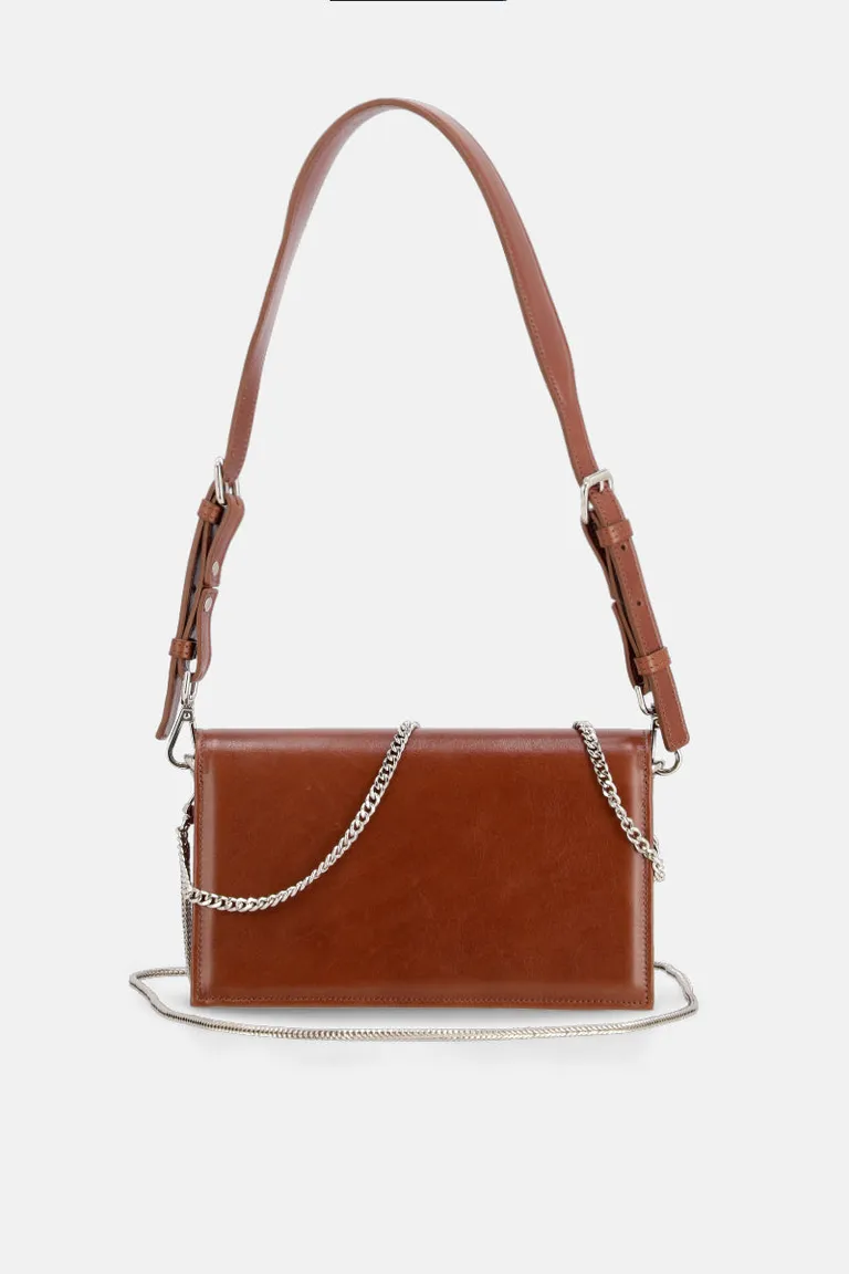 Bolso de mano de cuero vacuno con cadena metálica desmontable de Justaosadia en Bolsos y Carteras para argentina