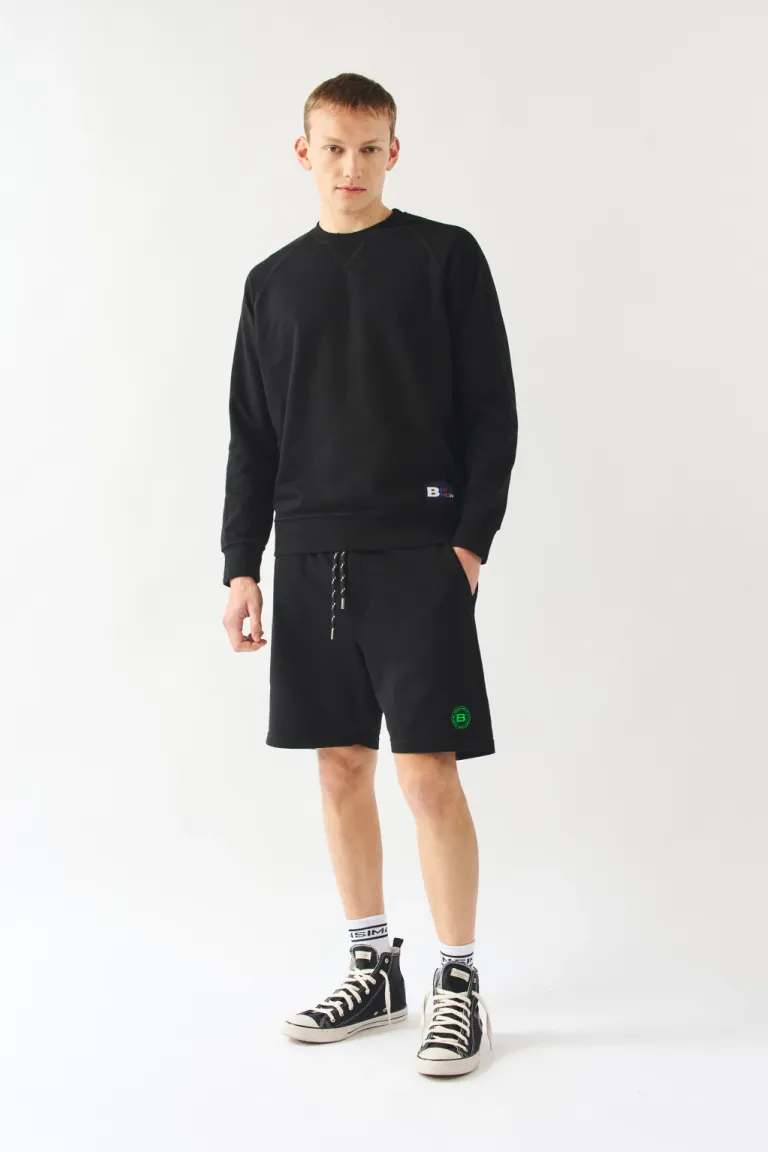 Buzo básico de algodón negro con cuello redondo y etiqueta de marca de Bensimon en Buzos y Sweaters para argentina