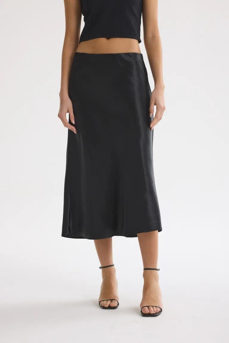 Falda pizarrita de corte midi para mujer, una prenda elegante y versátil de Akiabara en Faldas para argentina