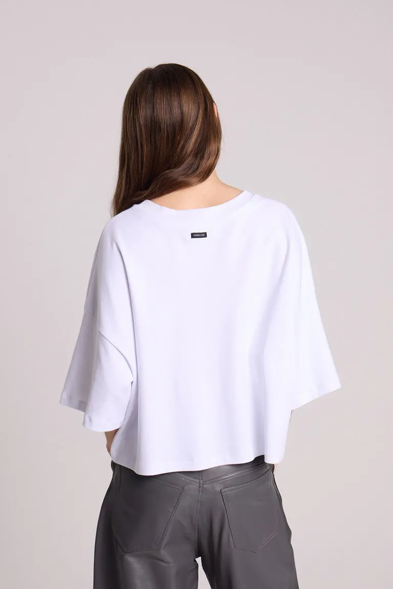 Remera blanca de corte boxy en algodón con mangas cortas de Maria Cher en Remeras para argentina