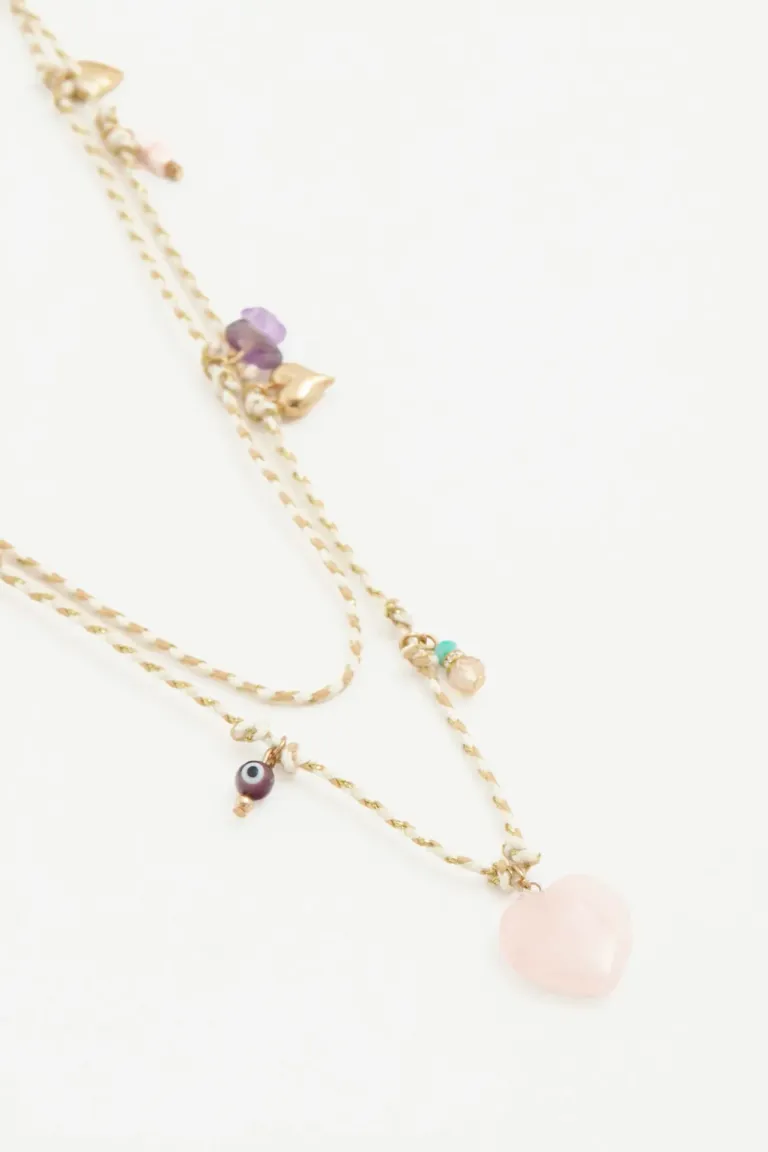 Collar doble con dijes decorativos y detalles brillantes de Rapsodia en Bijouterie para argentina