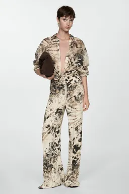 Pantalón fluido animal print de Mango en Pantalones para argentina
