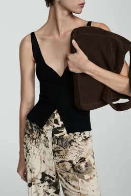 Pantalón fluido animal print de Mango en Pantalones para argentina