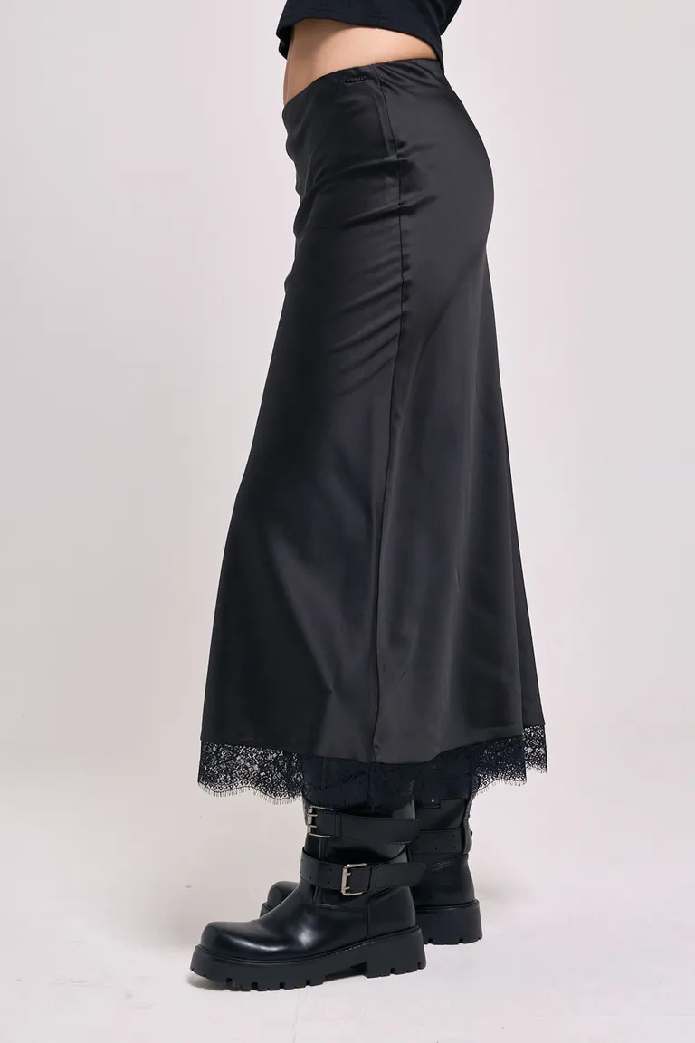 Falda midi con terminación de puntilla en el ruedo y caída fluida de 47 Street en Faldas para argentina