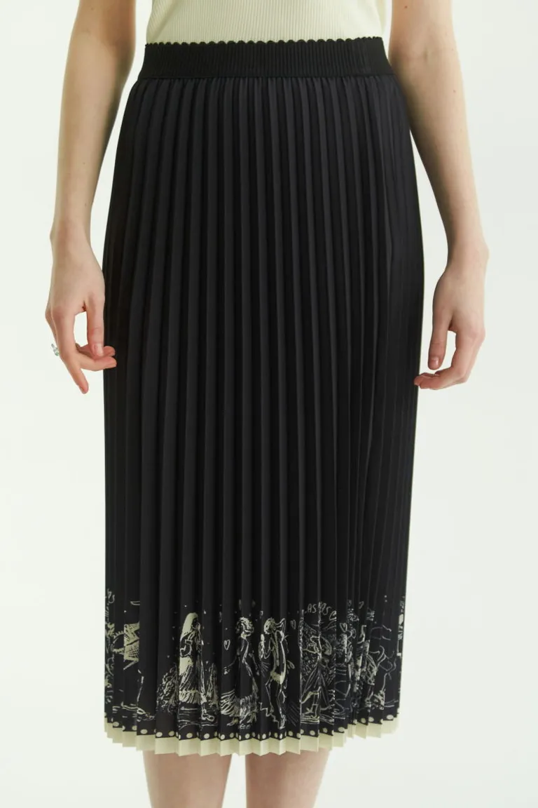 Falda plisada midi con estampado exclusivo y diseño fluido de Las Pepas en Faldas para argentina