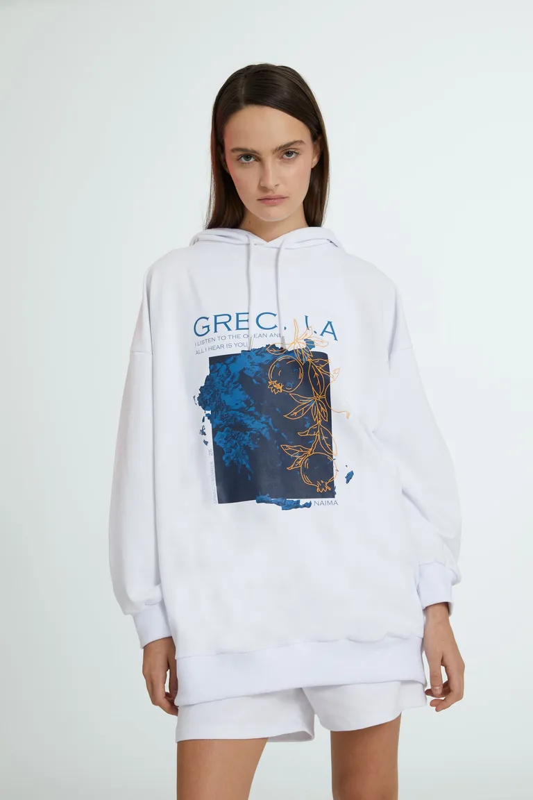 Buzo Blanco Oversize con Estampa Exclusiva - Versatilidad y Estilo Casual de Naíma en Buzos y Sweaters para argentina