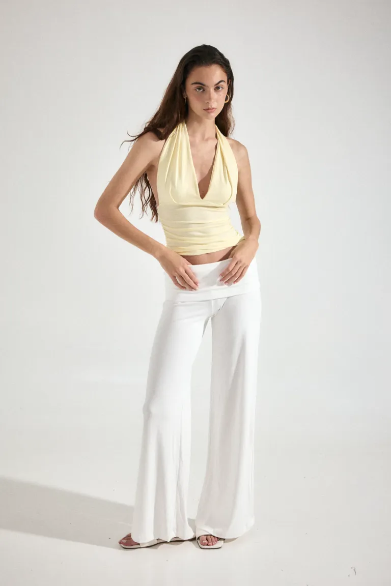 Top halter negro con frunces laterales, diseño elegante y versátil para la mujer de Audaz en Tops para argentina