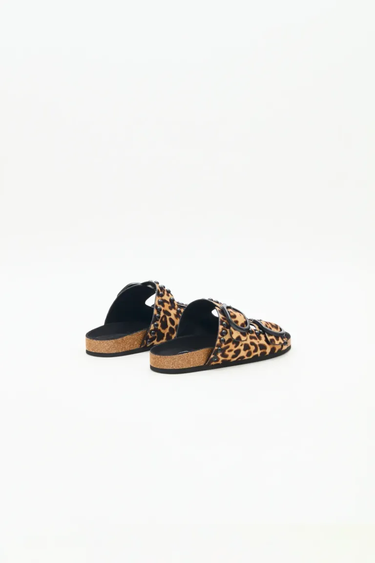 Sandalias bajas con estampado animal print y detalles metálicos de Rapsodia en Sandalias para argentina