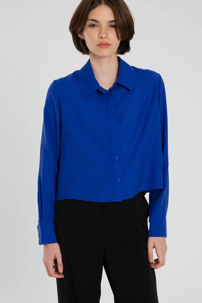 Camisa de twill azul con cuello clásico y cartera con botones de Naíma en Camisas para argentina