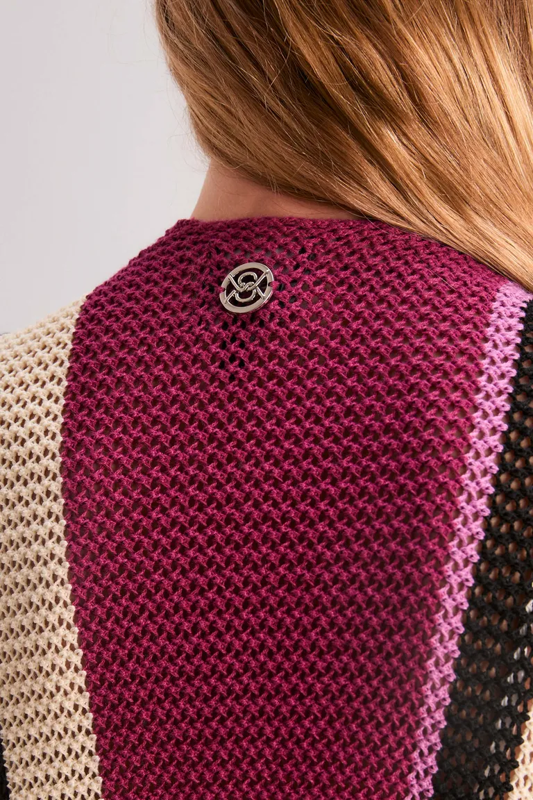 Elegante y cómoda ruana vacanza en tonos rojizos para la temporada de verano de Kosiuko en Capas y Ponchos para argentina