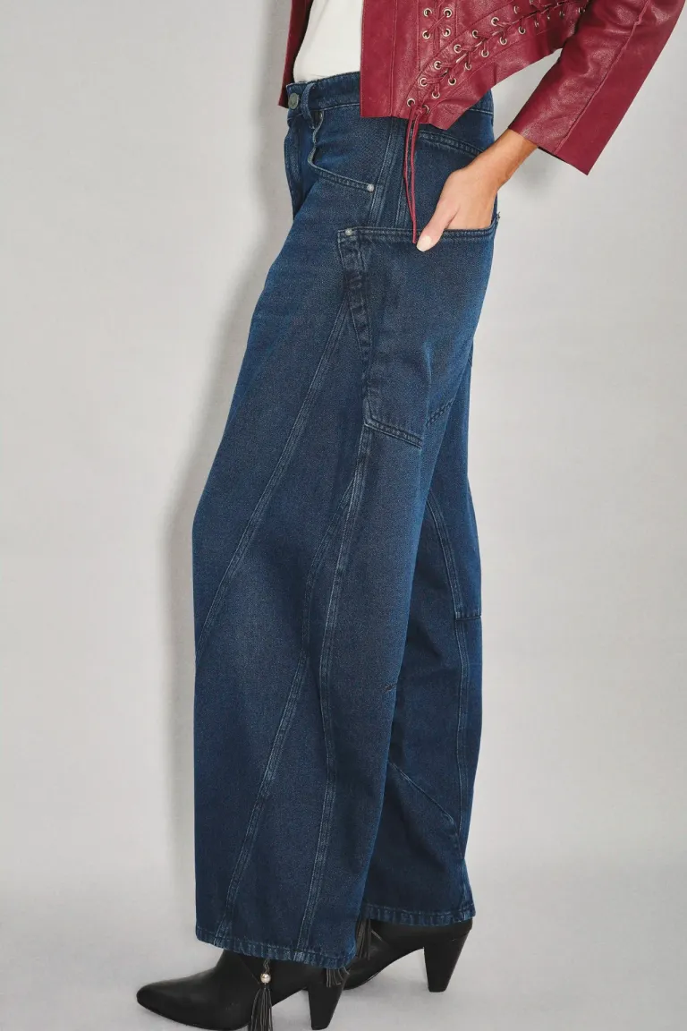 Jean de tiro medio alto con corte holgado y diseño de pierna curva con recortes de Rapsodia en Pantalones para argentina