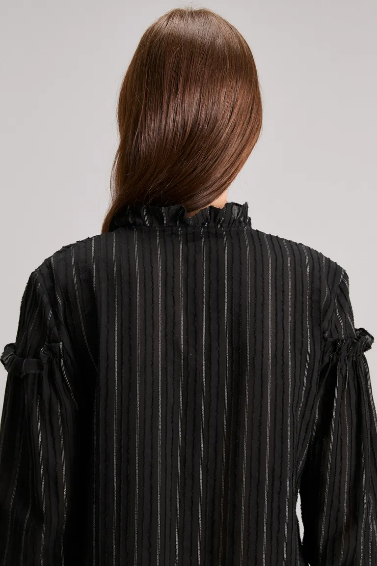 Blusa translúcida de corte oversize con volados y puños ajustables de Kosiuko en Blusas para argentina