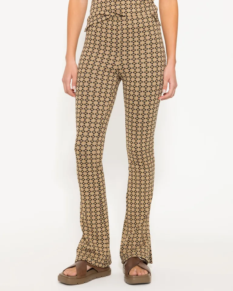 Pantalón de corte ajustado con diseño geométrico de brillo y textura de Jazmin Chebar en Pantalones para argentina