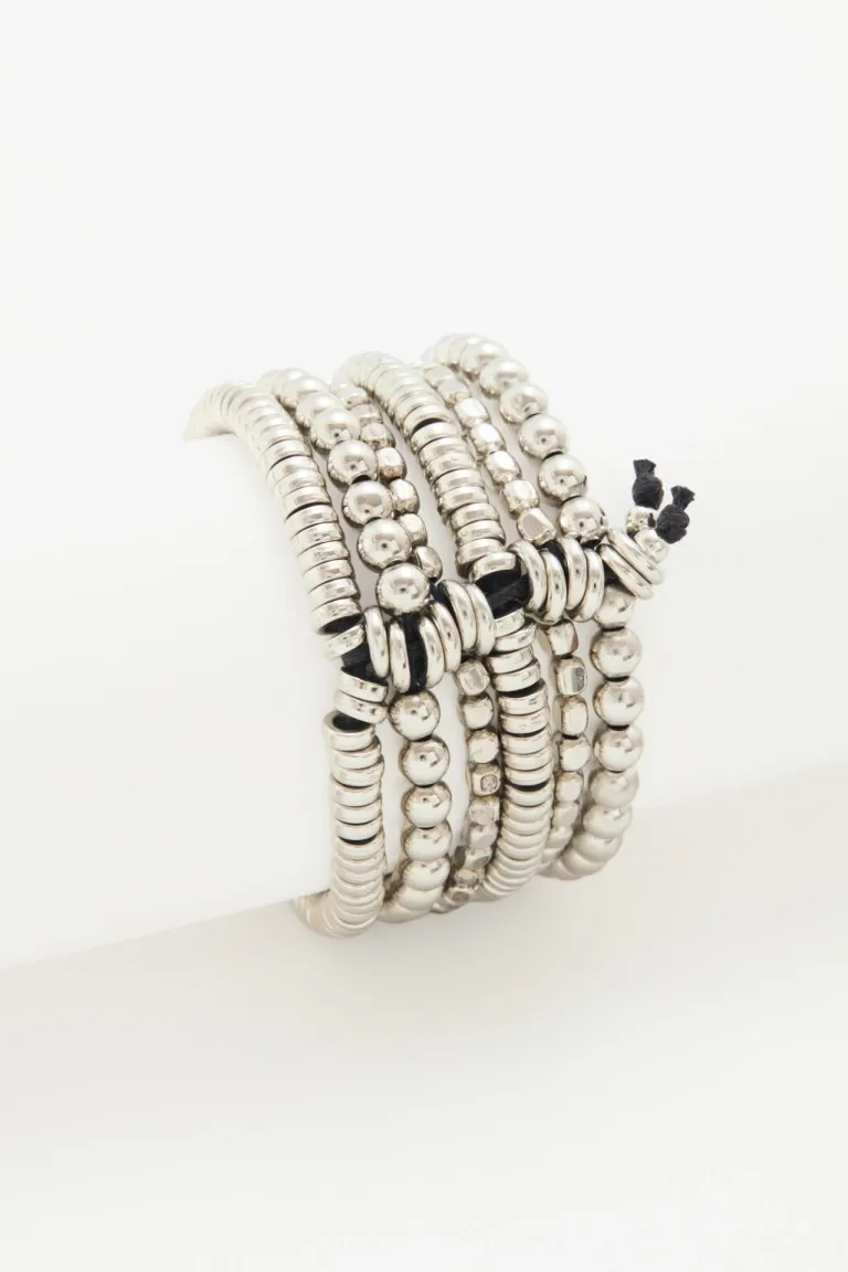 Elegante pulsera de múltiples capas con diseño en metales y acabado brillante de Rapsodia en Bijouterie para argentina