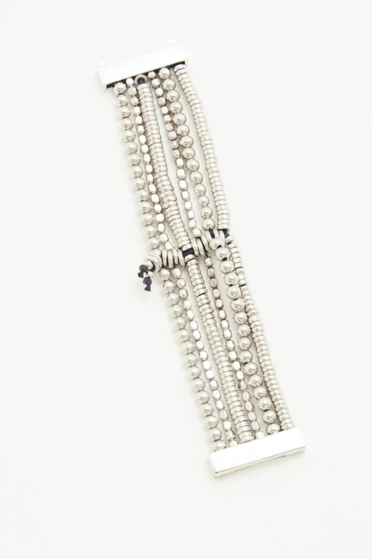 Elegante pulsera de múltiples capas con diseño en metales y acabado brillante de Rapsodia en Bijouterie para argentina