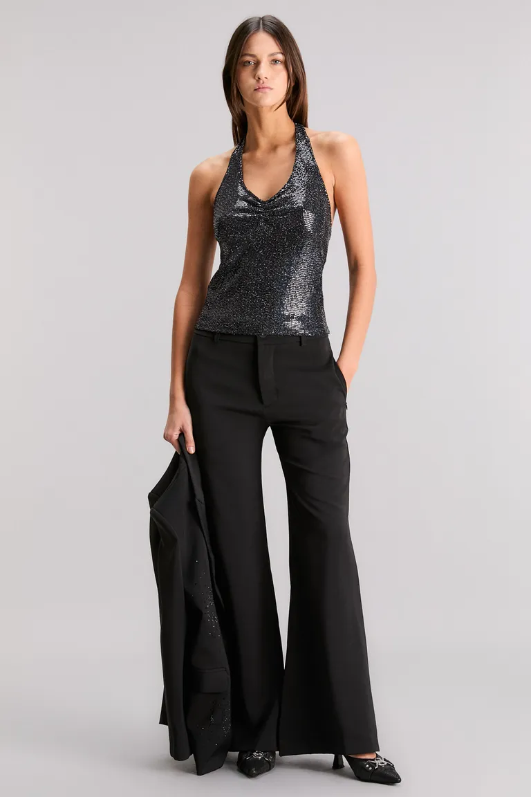 Top halter negro de punto brillante con escote fruncido y espalda descubierta de Kosiuko en Tops para argentina