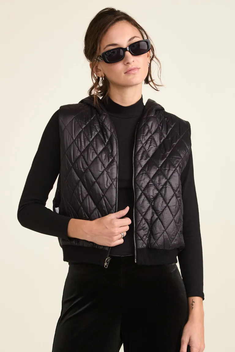 Chaleco con capucha diseño animal print reversible y cierre metálico de Cuesta Blanca en Chalecos para argentina