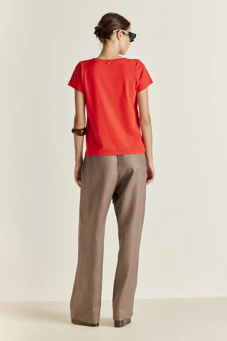 Remera de cuello en V con diseño de corazón en glitter de Tucci en Remeras para argentina